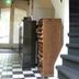 De Utrechtsche Dom in Gouda lobby with checkered floor and staircase