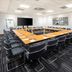 Holiday Inn London - Gatwick Airport By IHG meeting room with large boardroom table and black chairs