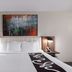 La Quinta Inn & Suites by Wyndham Knoxville Papermill guest room with king bed and bedside lamps