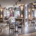 QT Auckland restaurant in Auckland with modern tables, pendant lighting and large windows
