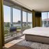 Van Der Valk Hotel Ara, Zwijndrecht room with bed and balcony overlooking the water