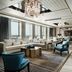 Langham Place, Xiamen lounge with city views, chandeliers, and modern seating