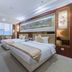 East Garden Hotel Chongqing guest room with two beds, large window and seating area