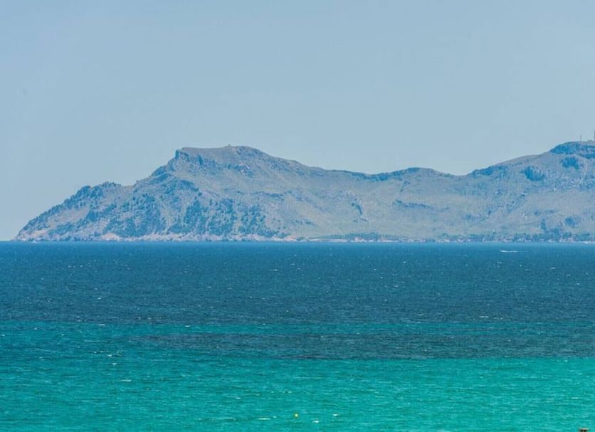 Hotel Vista Park in Can Picafort with sea view to turquoise water and distant rocky island