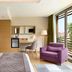 Ramada by Wyndham Bursa Cekirge Thermal & Spa room with balcony, purple armchair and desk in Bursa