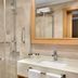 Ramada by Wyndham Bursa Cekirge Thermal & Spa bathroom with glass shower, vanity sink and mirror