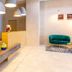 Marina Burgas Hotel lobby in Burgas with modern seating, pendant lights and colorful decor