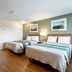 HomeTowne Studios by Red Roof Denver - Lakewood West guest room with two beds and window
