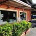 Tigullio Camping & Resort in Sestri Levante, exterior reception kiosk with window and shrubs
