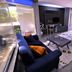 Çetinel Otel in Adana guest room with bed, sofa, desk, and floor-to-ceiling windows