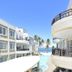 7Stones Boracay in Boracay with curved balconies, ocean view, and a pool leading to the beach
