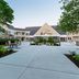 Four Points by Sheraton Buffalo Grove courtyard with patio seating and landscaped walkway