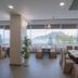 Vung Tau P&T Hotel dining room with large windows and mountain and sea views in Vung Tau
