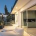 Sovn Experience+Lifestyle Cape Town balcony with lounge chairs and mountain view