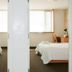 Humber College Lakeshore Residence Toronto twin room with two beds, desks, and large windows
