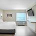 Holiday Inn St Louis Sw - Route 66 By IHG guest room with king bed and window view in St. Louis