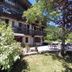 Chalet Appart'Hôtel l'Eau Vive in Saint-Nicolas-la-Chapelle with outdoor terrace and garden seating
