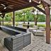 Hilton Garden Inn Birmingham SE/Liberty Park outdoor covered patio with seating and park views