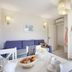 Terres de France - Résidence de la Cabre d'Or apartment with kitchenette, sofa, and dining table in Cabriès