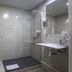 Cuatro Naciones Barcelona bathroom with walk-in glass shower and wall-mounted sink