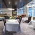 Best Western Plus Palatin Kongress Hotel in Wiesloch dining room with set tables and large windows