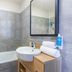 Appart'City Classic Reims Parc des Expositions bathroom with bathtub, shower screen and sink