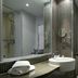 DoubleTree by Hilton Stratford upon Avon bathroom with sink, mirror, shower and towel rack