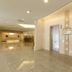 Shimonoseki Station West Washington Hotel Plaza lobby with two elevators and polished tile floors