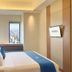 Lamora Kota Lama Surabaya guest room with double bed and city view window
