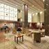 Hotel Jal City Tsukuba lobby with seating area, marble columns and tall windows in Tsukuba