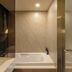 Hotel Londoner Gwanganlli bathroom in Busan with a bathtub and walk-in shower