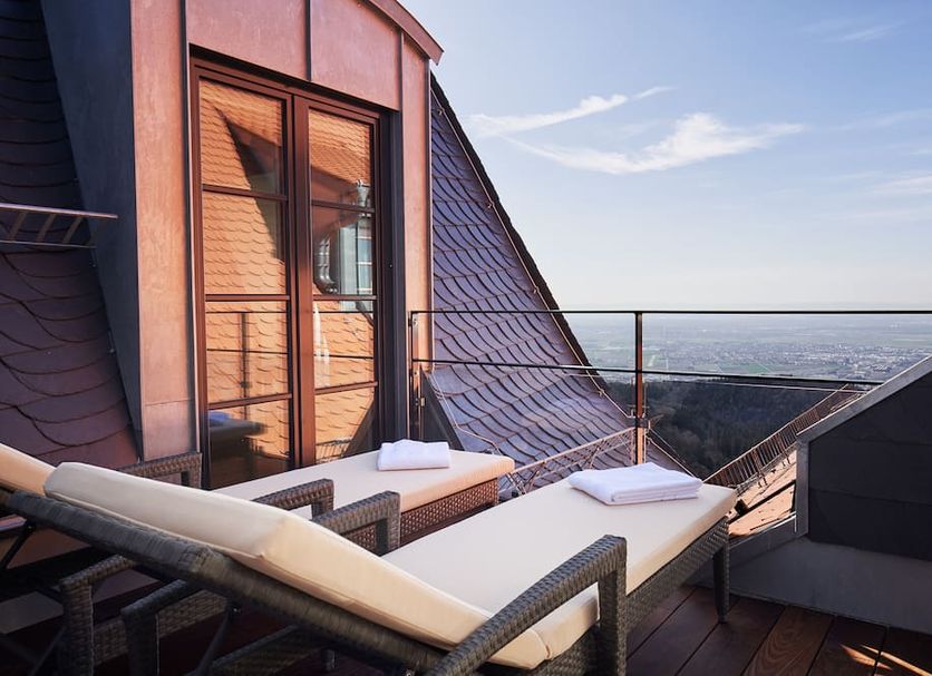 Berggasthof Königstuhl in Heidelberg rooftop terrace with loungers and scenic city view