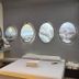Astrotel Cubao in Quezon City guest room with porthole windows and cloud-themed wall art