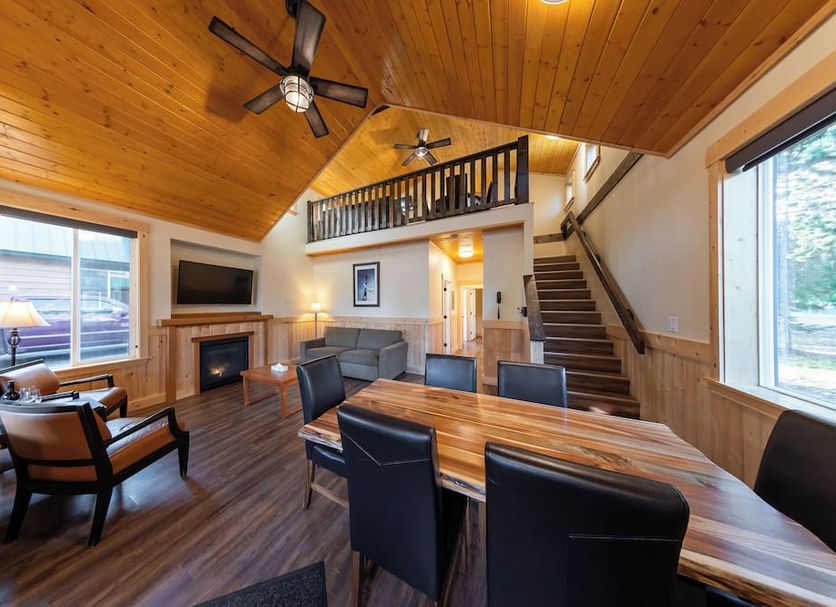Manning Park Resort in Manning Park lobby with vaulted wood ceiling, fireplace, loft and staircase
