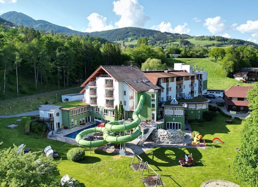 Familienhotel Trebesingerhof in Trebesing with outdoor water slides and mountain views