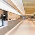Ji Hotel Guiyang Fountain lobby with modern reception area and wood-accented ceiling in Guiyang