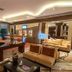 Anemon Ege Hotel in Izmir lobby lounge with seating area, coffee tables, and warm ambient lighting