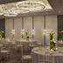 Sheraton Philadelphia University City Hotel banquet hall with round dining tables and chandeliers