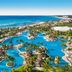 Jungala Hotel at VidantaWorld Riviera Maya in Cancún with tropical lagoon pools and ocean views