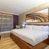 Hilton Club West 57th Street New York guest room with king bed, city view window and desk