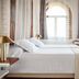 Muleta de Ca S'Hereu in Port de Sóller: bright room with twin beds, arched windows and sofa