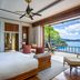 Anantara Maia Seychelles Villas in Anse Boileau: villa bedroom with ocean-view terrace and tropical bay