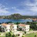 Akay Garden Family Club in Ildir with villas, landscaped grounds, and bay and hillside views