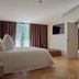 Andorra Park Hotel in Andorra la Vella bedroom with balcony doors and adjoining sitting room