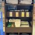 Toyoko Inn Hokkaido Tomakomai Ekimae breakfast area with shelf of towels, packaged items and cups