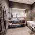 Romantik Hotel Hirschen Parsberg modern bathroom with freestanding tub, double sink vanity and walk-in shower