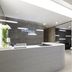 Novotel Ambassador Suwon reception desk with InBalance Fitness sign and modern lobby interior