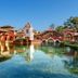 ITC Grand Goa, A Luxury Collection Resort & Spa, Goa: lagoon pool with arched bridge and resort buildings