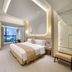 Zhehai Hotel Ningbo guest room with large window and city view in Ningbo