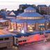 Silver Beach Hotel in Saint Joseph exterior with train passing in front at dusk